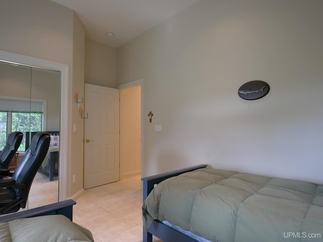 52765 Bootjack Rd, Lake Linden, MI 49945 - bedroom with light tile patterned flooring and a closet