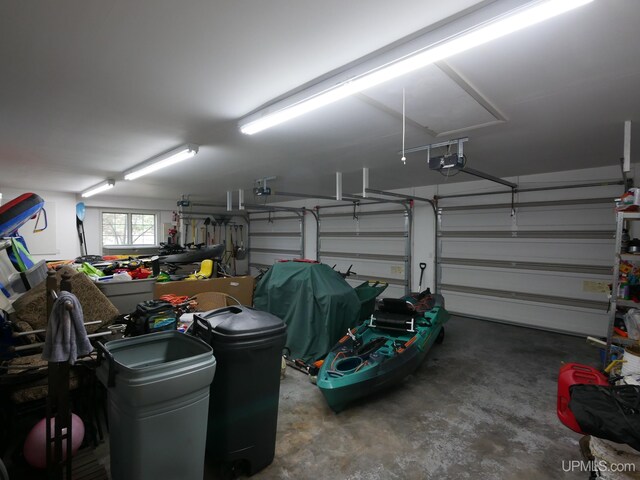 52765 Bootjack Rd, Lake Linden, MI 49945 - garage featuring a garage door opener