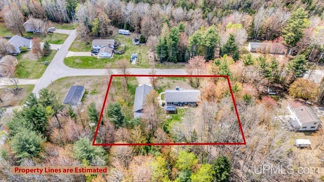 6376 Marie L.45 Ln, Escanaba, MI 49829 - aerial overview of property's location with property boundaries highlighted and a heavily wooded area