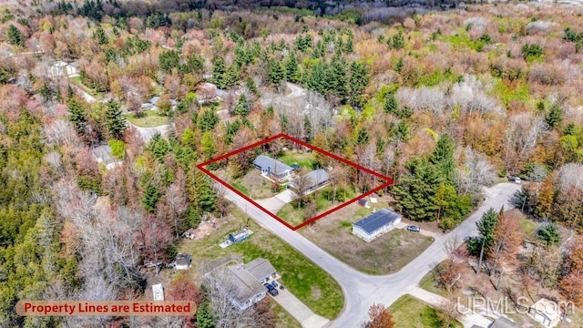 6376 Marie L.45 Ln, Escanaba, MI 49829 - aerial view of property and surrounding area featuring property parcel outlined and a forest
