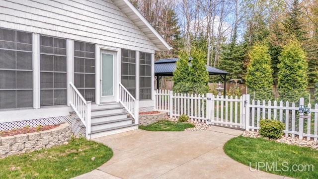 6376 Marie L.45 Ln, Escanaba, MI 49829 - entrance to property featuring a patio area
