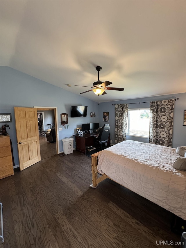59 Forest Dr, Negaunee, MI 49866 - bedroom with dark wood-type flooring, lofted ceiling, an office area, and ceiling fan