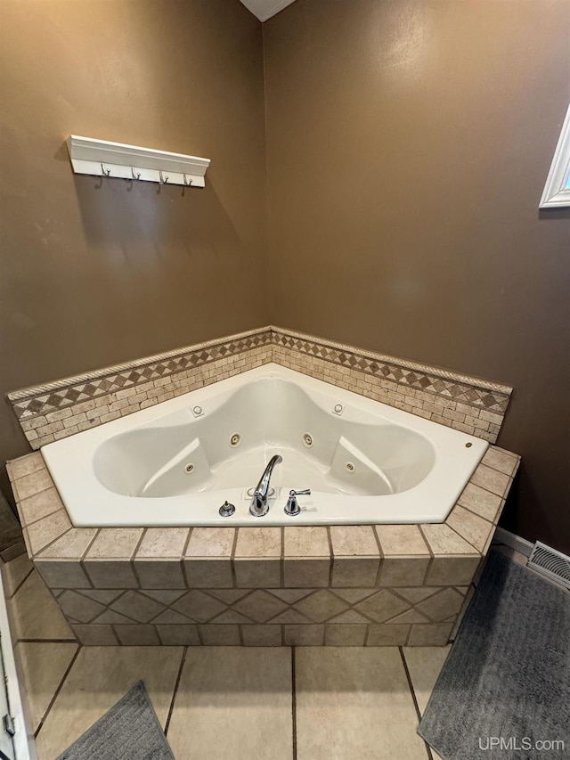 59 Forest Dr, Negaunee, MI 49866 - bathroom with a jetted tub and tile patterned floors