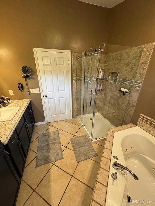 59 Forest Dr, Negaunee, MI 49866 - bathroom with a shower stall, a whirlpool tub, vanity, and tile patterned flooring