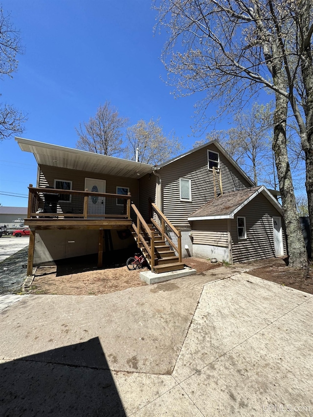59 Forest Dr, Negaunee, MI 49866 - view of front facade featuring a deck