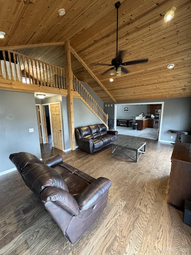 59 Forest Dr, Negaunee, MI 49866 - living area with a ceiling fan, wood ceiling, wood finished floors, high vaulted ceiling, and baseboards