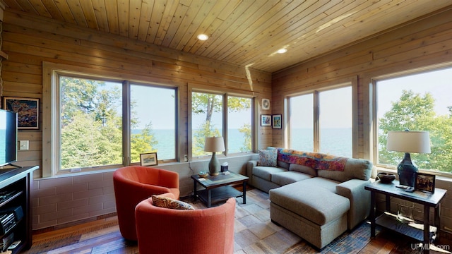 N9910 Shore Dr, Au Train, MI 49806 - living room featuring wooden ceiling, recessed lighting, wood walls, and a water view