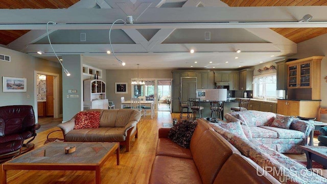 N9910 Shore Dr, Au Train, MI 49806 - living area featuring light wood-style floors, a chandelier, wooden ceiling, and recessed lighting