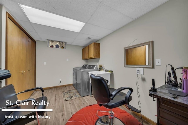 1080 Highland Dr, Saint Clair, MI 48079 - laundry room with cabinet space, light wood-type flooring, baseboards, and washer and clothes dryer