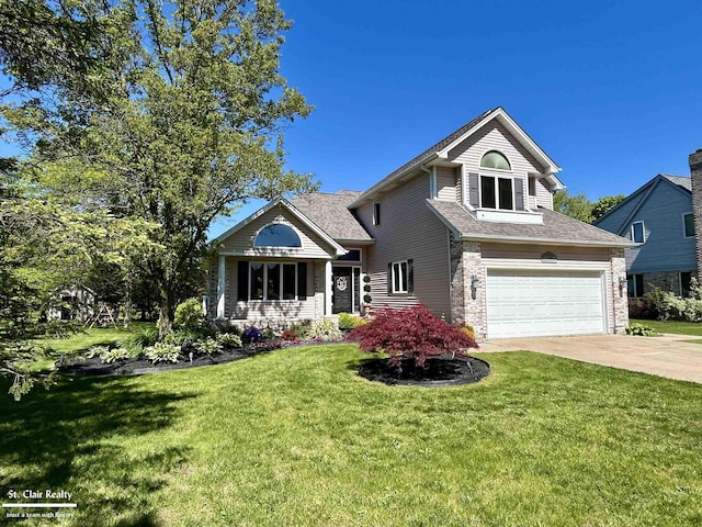 1080 Highland Dr, Saint Clair, MI 48079 - view of front of property featuring driveway, an attached garage, and a front yard