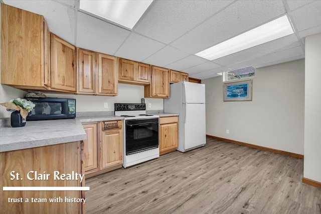 1080 Highland Dr, Saint Clair, MI 48079 - kitchen featuring electric range oven, freestanding refrigerator, black microwave, a paneled ceiling, and baseboards