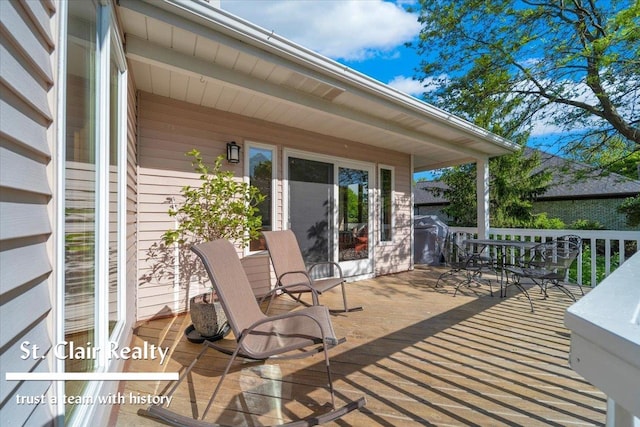 1080 Highland Dr, Saint Clair, MI 48079 - wooden terrace with outdoor dining area