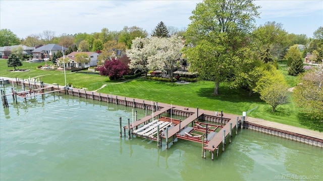 49016 Pointe Lakeview Dr, Chesterfield, MI 48047 - dock area featuring boat lift, a water view, and view of wooded area