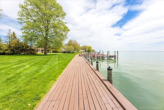 49016 Pointe Lakeview Dr, Chesterfield, MI 48047 - dock with a water view, a yard, and boat lift