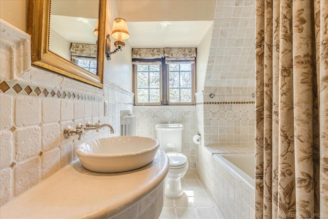 49016 Pointe Lakeview Dr, Chesterfield, MI 48047 - bathroom with tile walls, tile patterned floors, toilet, tiled shower / bath combo, and vanity