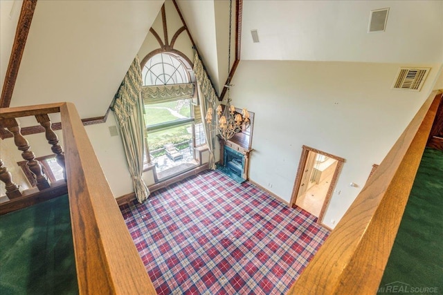 49016 Pointe Lakeview Dr, Chesterfield, MI 48047 - entrance foyer featuring a towering ceiling, stairway, and a chandelier