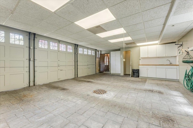 49016 Pointe Lakeview Dr, Chesterfield, MI 48047 - garage with a sink