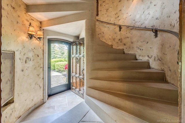 49016 Pointe Lakeview Dr, Chesterfield, MI 48047 - foyer with stone tile floors and stairway