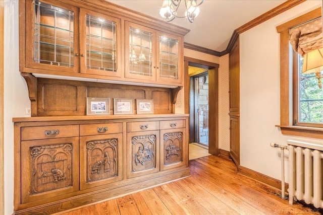 49016 Pointe Lakeview Dr, Chesterfield, MI 48047 - corridor featuring radiator heating unit, ornamental molding, baseboards, and light wood-type flooring