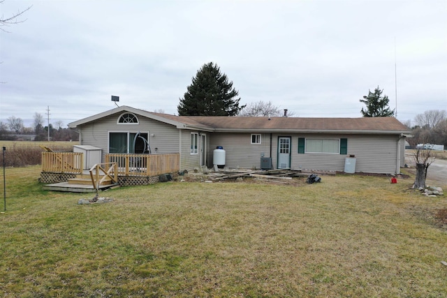 6669 Lakeshore Rd, Lexington, MI 48450 - back of property with a deck and a lawn