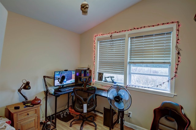 6669 Lakeshore Rd, Lexington, MI 48450 - office area with vaulted ceiling, wood finished floors, and baseboards