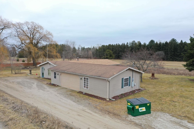 6669 Lakeshore Rd, Lexington, MI 48450 - view of front facade featuring driveway and an attached garage
