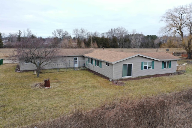 6669 Lakeshore Rd, Lexington, MI 48450 - back of house featuring a shingled roof