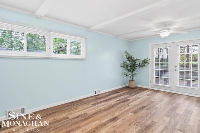 22574 Katzman St, Clinton Township, MI 48035 - spare room with beam ceiling, french doors, wood finished floors, baseboards, and ceiling fan