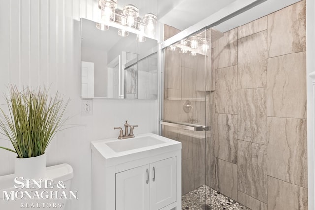 22574 Katzman St, Clinton Township, MI 48035 - bathroom with a chandelier, a stall shower, vanity, and toilet