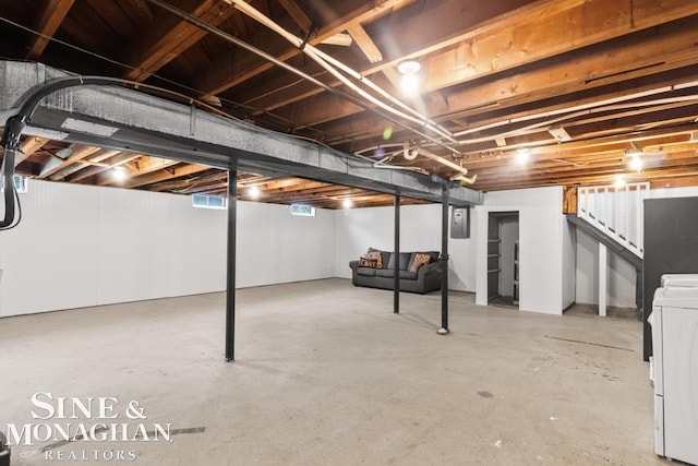 22574 Katzman St, Clinton Township, MI 48035 - basement with washer / dryer, stairway, and electric panel