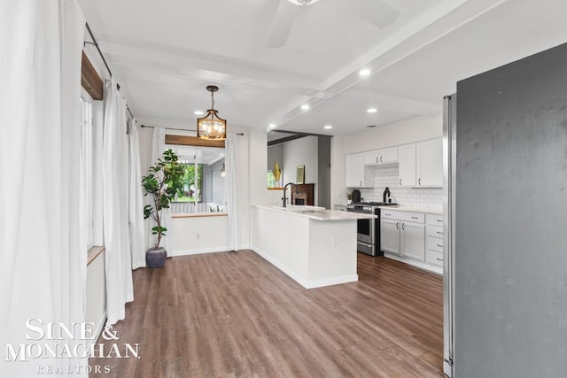 22574 Katzman St, Clinton Township, MI 48035 - kitchen with appliances with stainless steel finishes, dark wood-style floors, recessed lighting, white cabinets, and light countertops