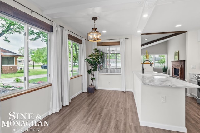 22574 Katzman St, Clinton Township, MI 48035 - kitchen with a sink, a chandelier, recessed lighting, wood finished floors, and beam ceiling