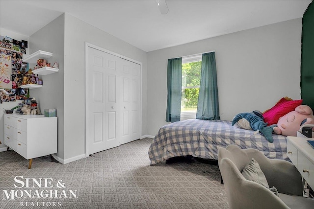 1923 Clinton Ave, Saint Clair, MI 48079 - bedroom featuring light carpet, baseboards, a closet, and a ceiling fan