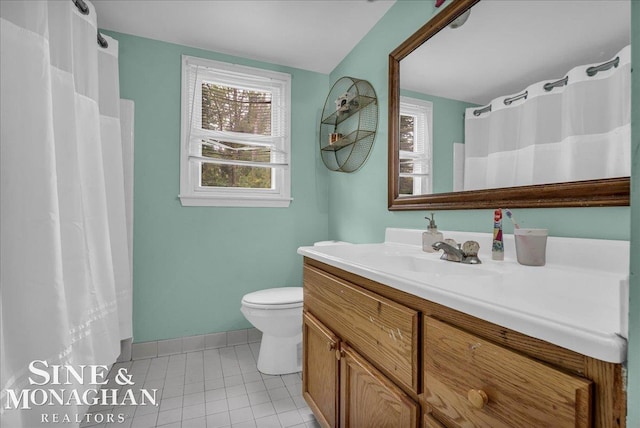 1923 Clinton Ave, Saint Clair, MI 48079 - full bathroom featuring vanity, toilet, tile patterned floors, and baseboards