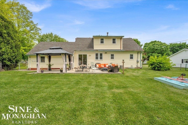1923 Clinton Ave, Saint Clair, MI 48079 - back of property with a patio area, a lawn, a gazebo, and an outdoor living space