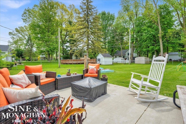 1923 Clinton Ave, Saint Clair, MI 48079 - view of patio with an outdoor hangout area, view of scattered trees, and a shed