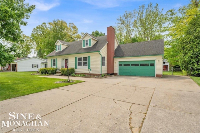1923 Clinton Ave, Saint Clair, MI 48079 - new england style home with a chimney, a garage, driveway, and a front yard