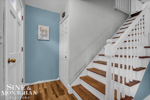 1923 Clinton Ave, Saint Clair, MI 48079 - staircase with wood finished floors and baseboards