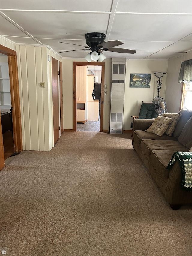1923 Bear Dr, Oscoda, MI 48750 - living area with ceiling fan and carpet floors
