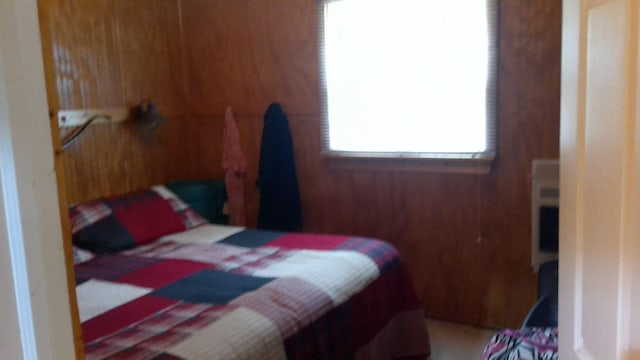 7880 S Dyer Dr, Falmouth, MI 49632 - bedroom featuring wooden walls