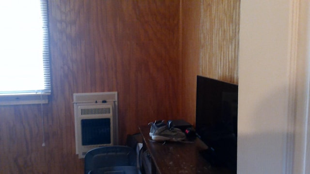 7880 S Dyer Dr, Falmouth, MI 49632 - office space with heating unit and wood walls