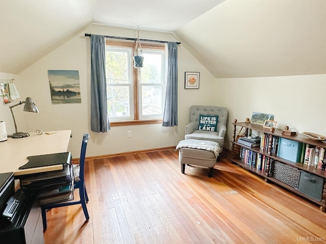 812 Spruce St, Marquette, MI 49855 - sitting room with hardwood / wood-style floors, lofted ceiling, a desk, and baseboards
