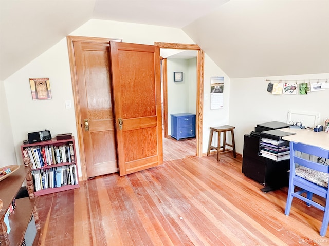 812 Spruce St, Marquette, MI 49855 - office area featuring light wood-style floors and vaulted ceiling