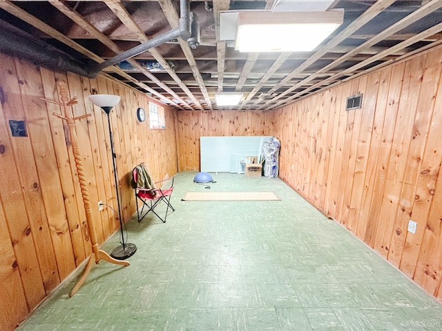 812 Spruce St, Marquette, MI 49855 - below grade area with wooden walls and tile patterned floors