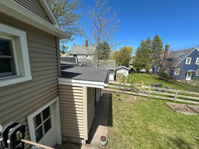 812 Spruce St, Marquette, MI 49855 - view of yard featuring a residential view and a garden