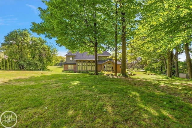63011 Indian Hills Dr Unit # 1, Washington Twp, MI 48095 - view of grassy yard