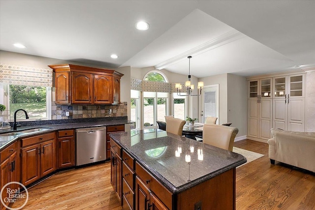 63011 Indian Hills Dr Unit # 1, Washington Twp, MI 48095 - kitchen with stainless steel dishwasher, a sink, light wood finished floors, a chandelier, and recessed lighting