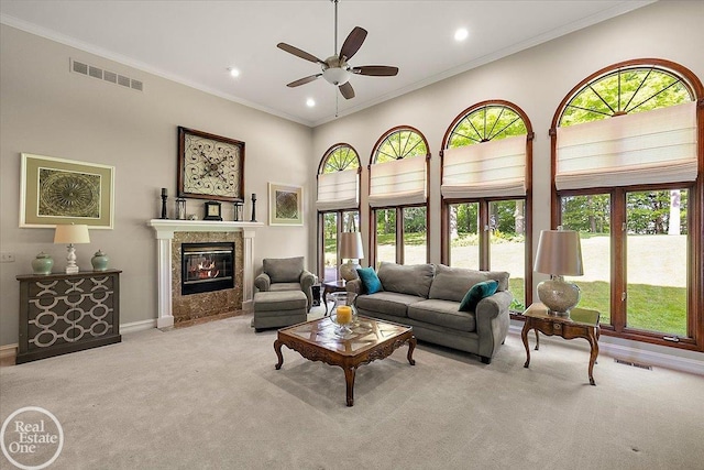 63011 Indian Hills Dr Unit # 1, Washington Twp, MI 48095 - carpeted living area with ceiling fan, a tiled fireplace, baseboards, recessed lighting, and crown molding