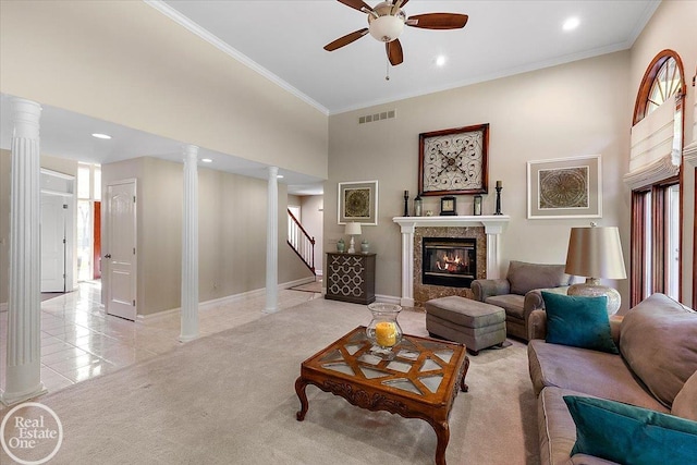63011 Indian Hills Dr Unit # 1, Washington Twp, MI 48095 - living area with a ceiling fan, ornate columns, stairs, a fireplace, and crown molding
