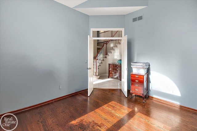 63011 Indian Hills Dr Unit # 1, Washington Twp, MI 48095 - unfurnished bedroom with baseboards and wood finished floors